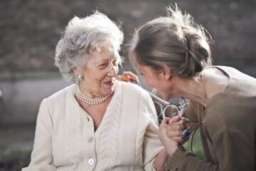 Grandma talking with adult granddaughter